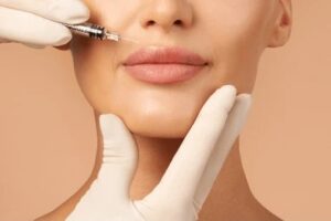 Woman getting Juvedern lip filler in Henderson, NV