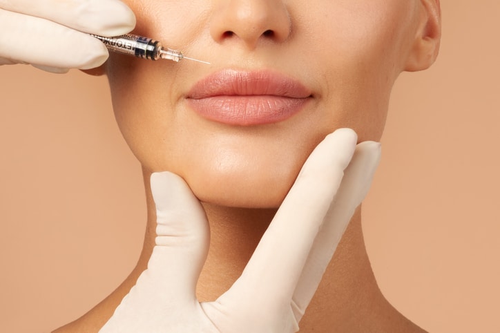 Woman getting Restylane filler in her lips in Henderson, NV