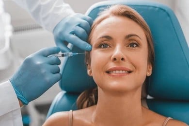 Woman smiling getting Xeomin injections in Henderson, NV