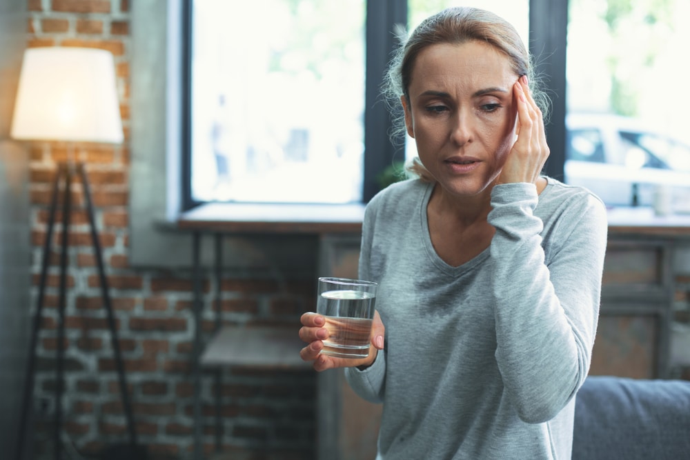 Middle-age woman looking concerned due to symptoms of hormone imbalance in Henderson, NV